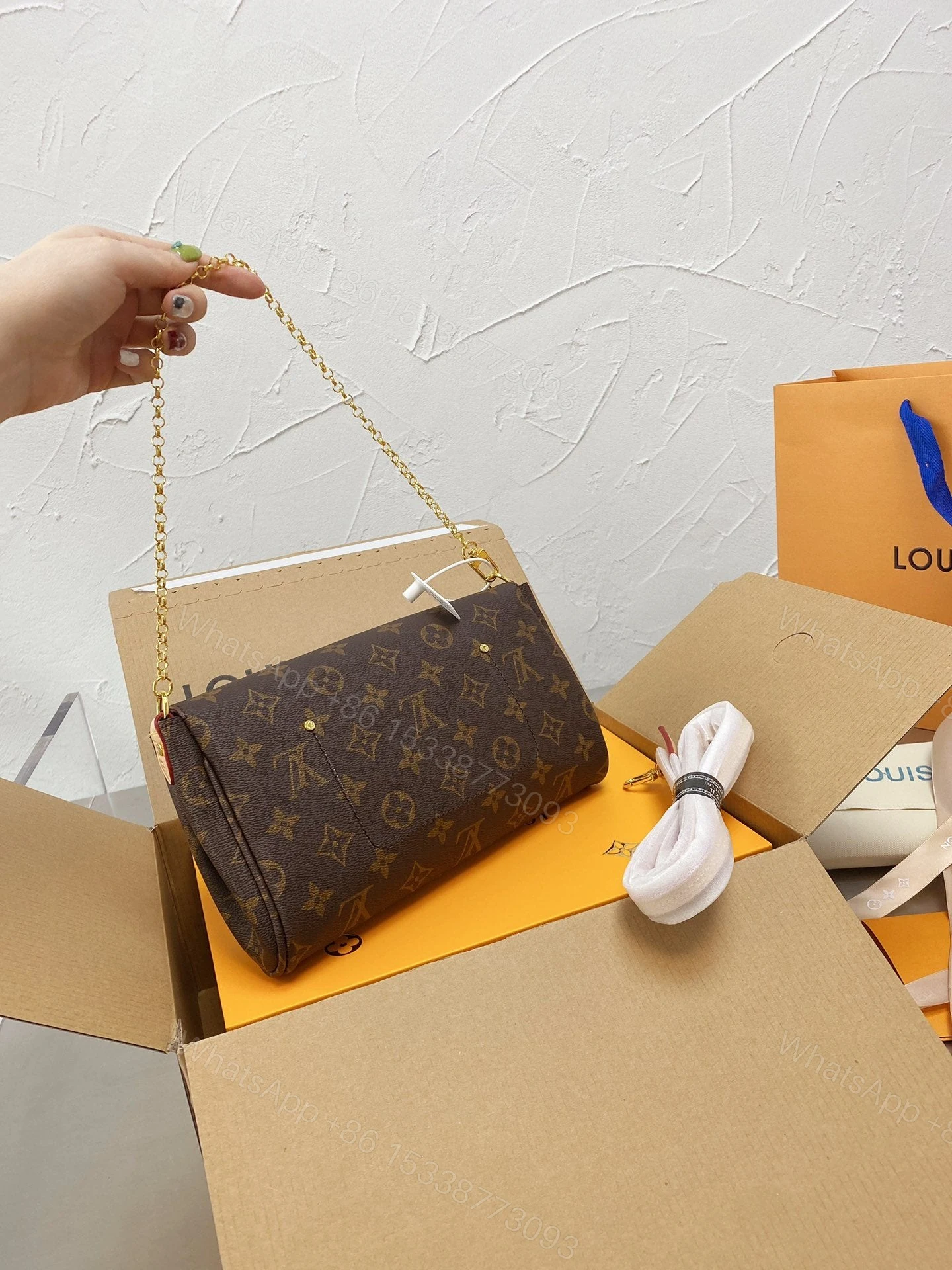 View 3 of Louis Vuitton Monogram Favorite MM