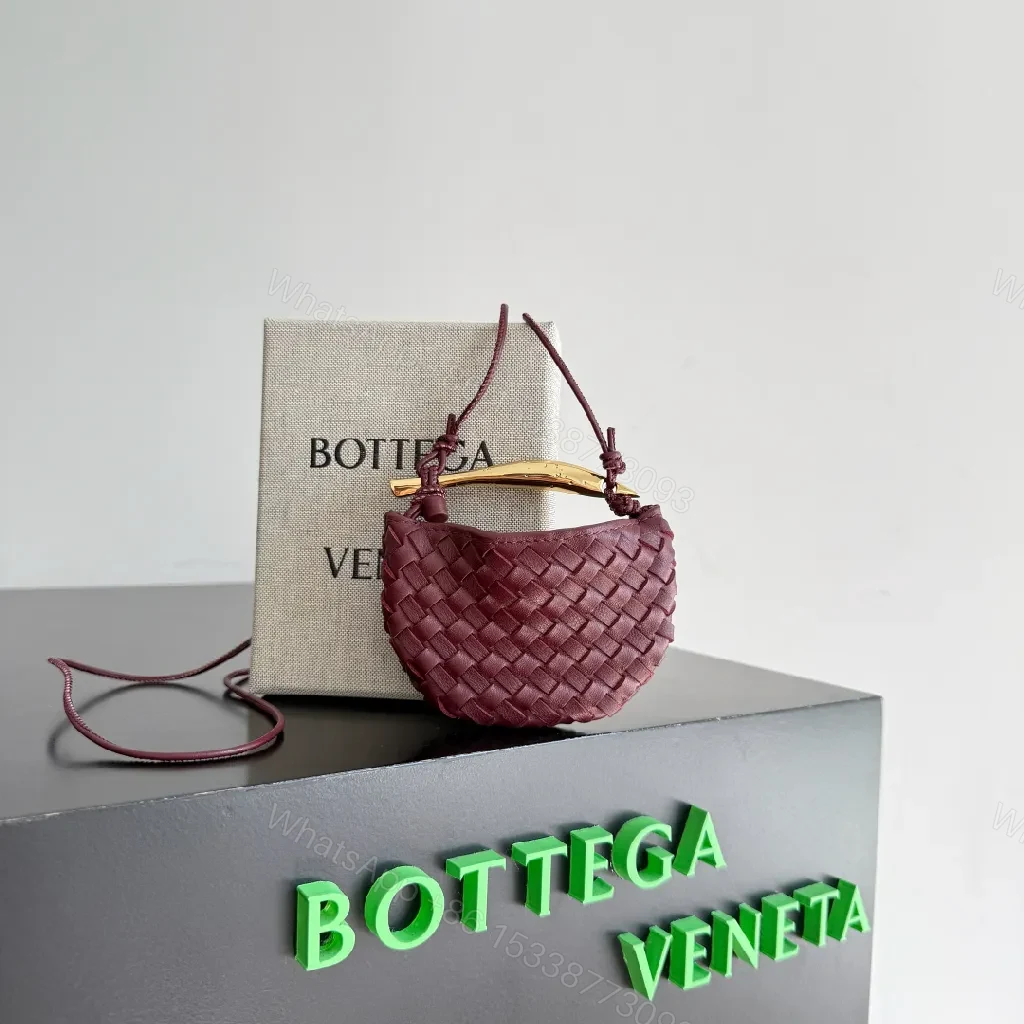 Textured Plum Mini Bag: Handwoven Leather, Luxe Compact — view 1