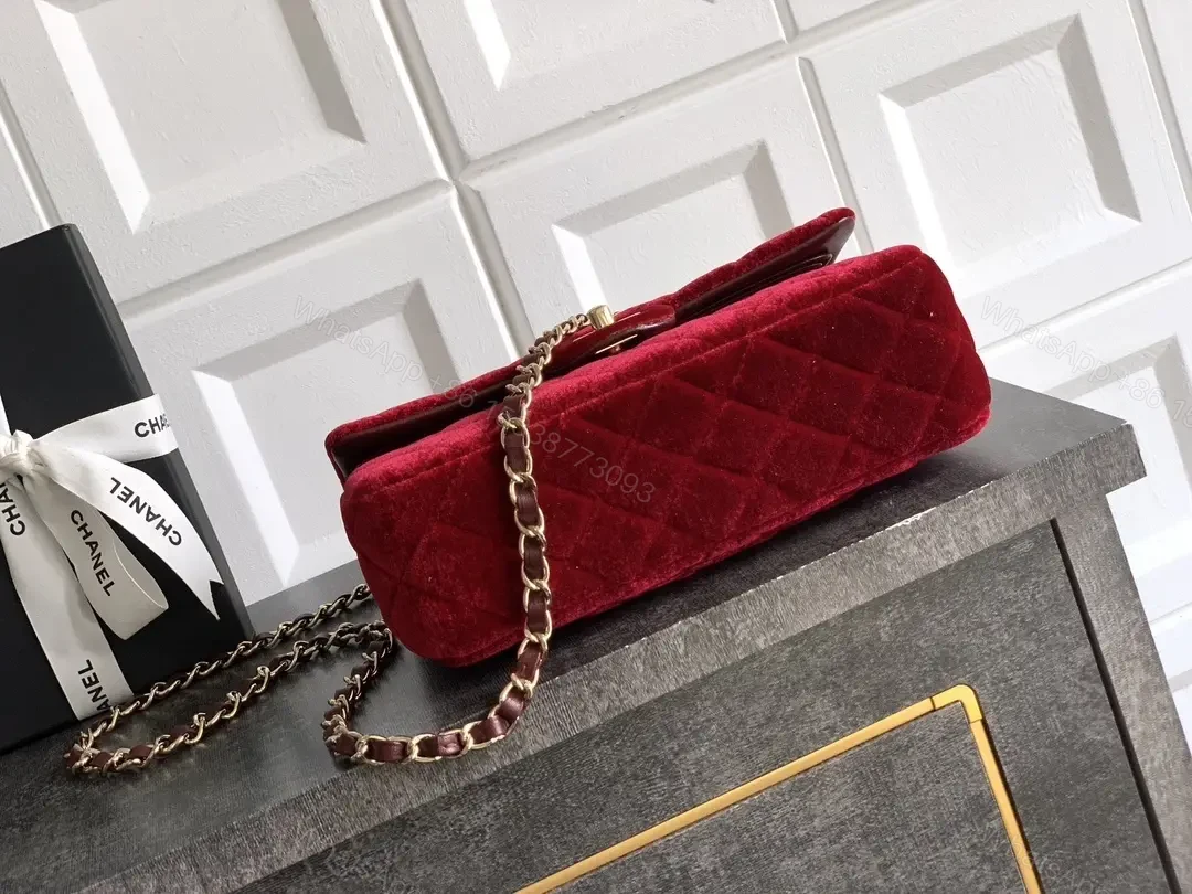 View 2 of Rich Velvet Red Flap Bag with Gold Chain Embellishment