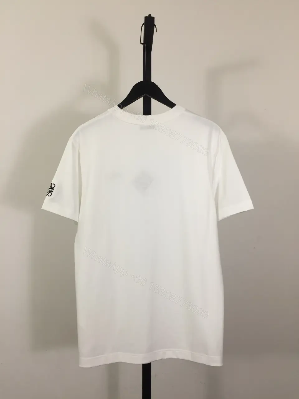 View 2 of Minimalist White Tee with Signature Accents—Premium Cotton-jersey Tee