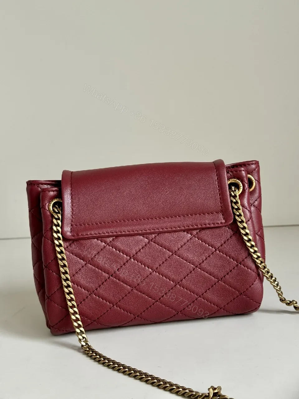 View 5 of Richly Textured Burgundy Leather Bag, Compact, Quilted Crossbody