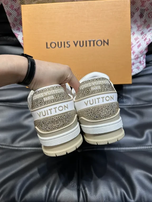 View 2 of White Leather Sneakers with Gold Accents, Perforated Toe, LV Logo