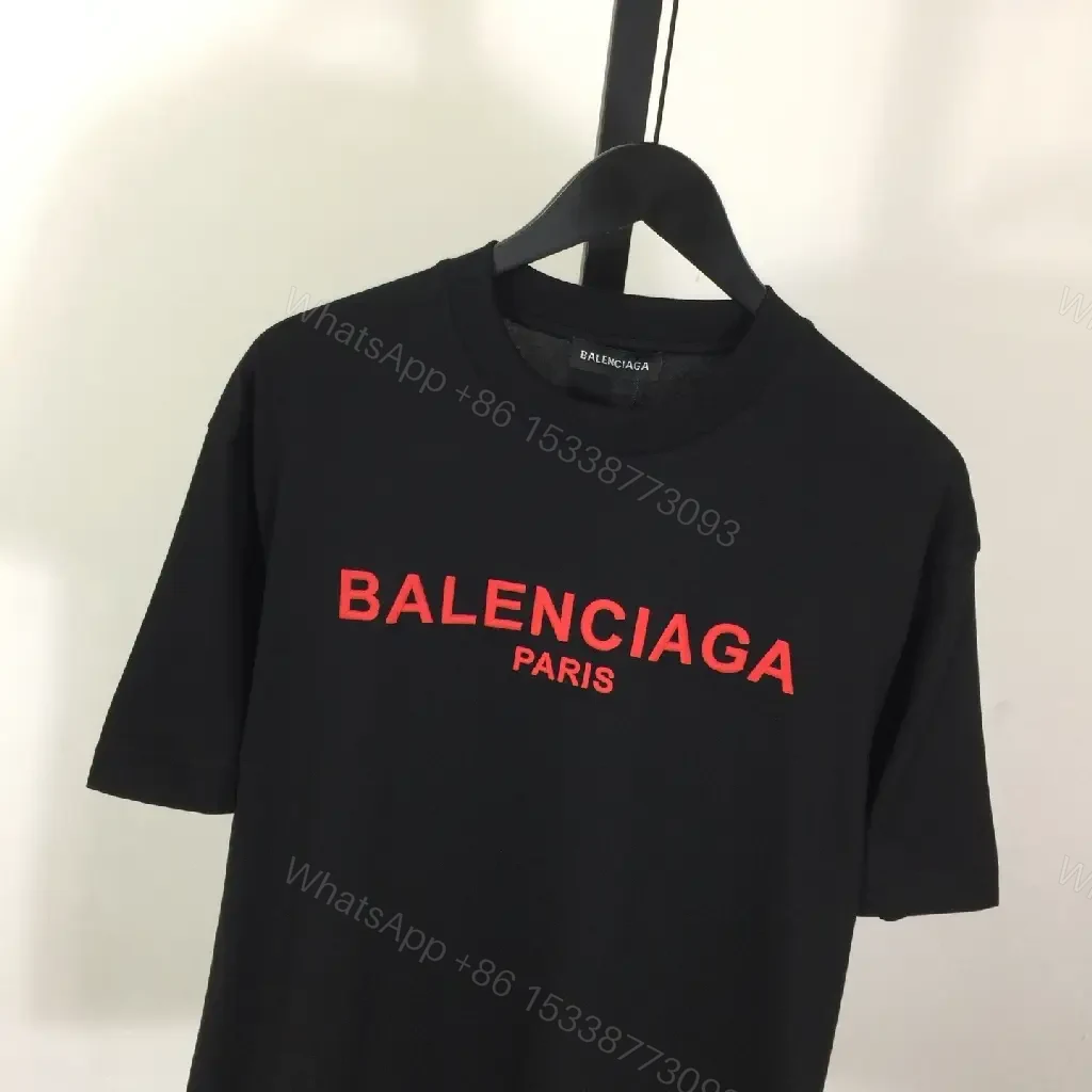 View 7 of Black Cotton Tee — Elevated Streetwear Logo Tee