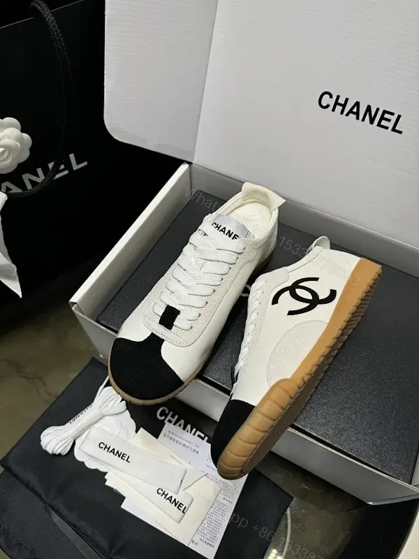 Two-Tone White/Black Gum-Soled High-Top Sneakers — view 1
