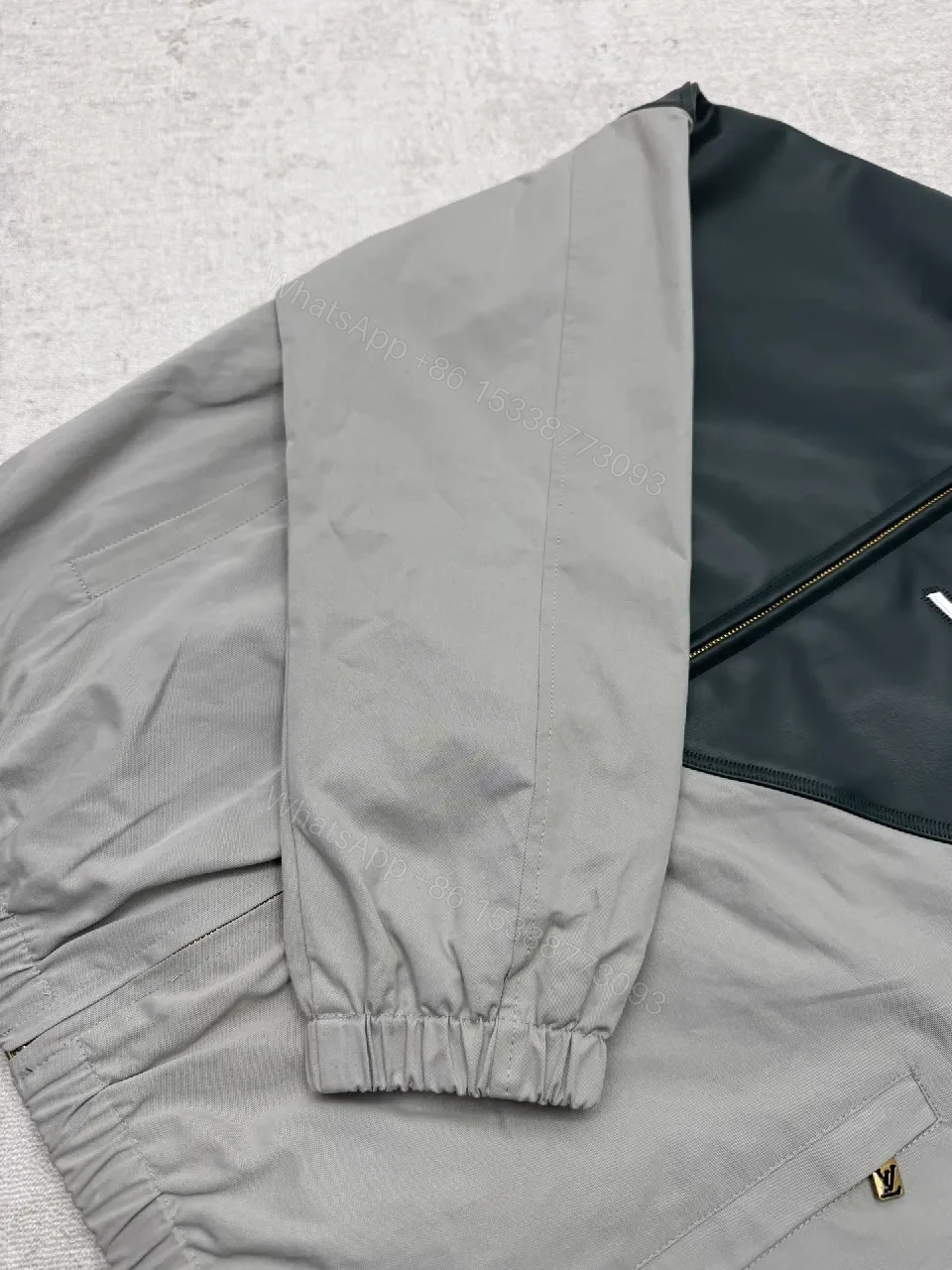 View 3 of Color-Blocked Leather-Accent Windbreaker with LV Detailing