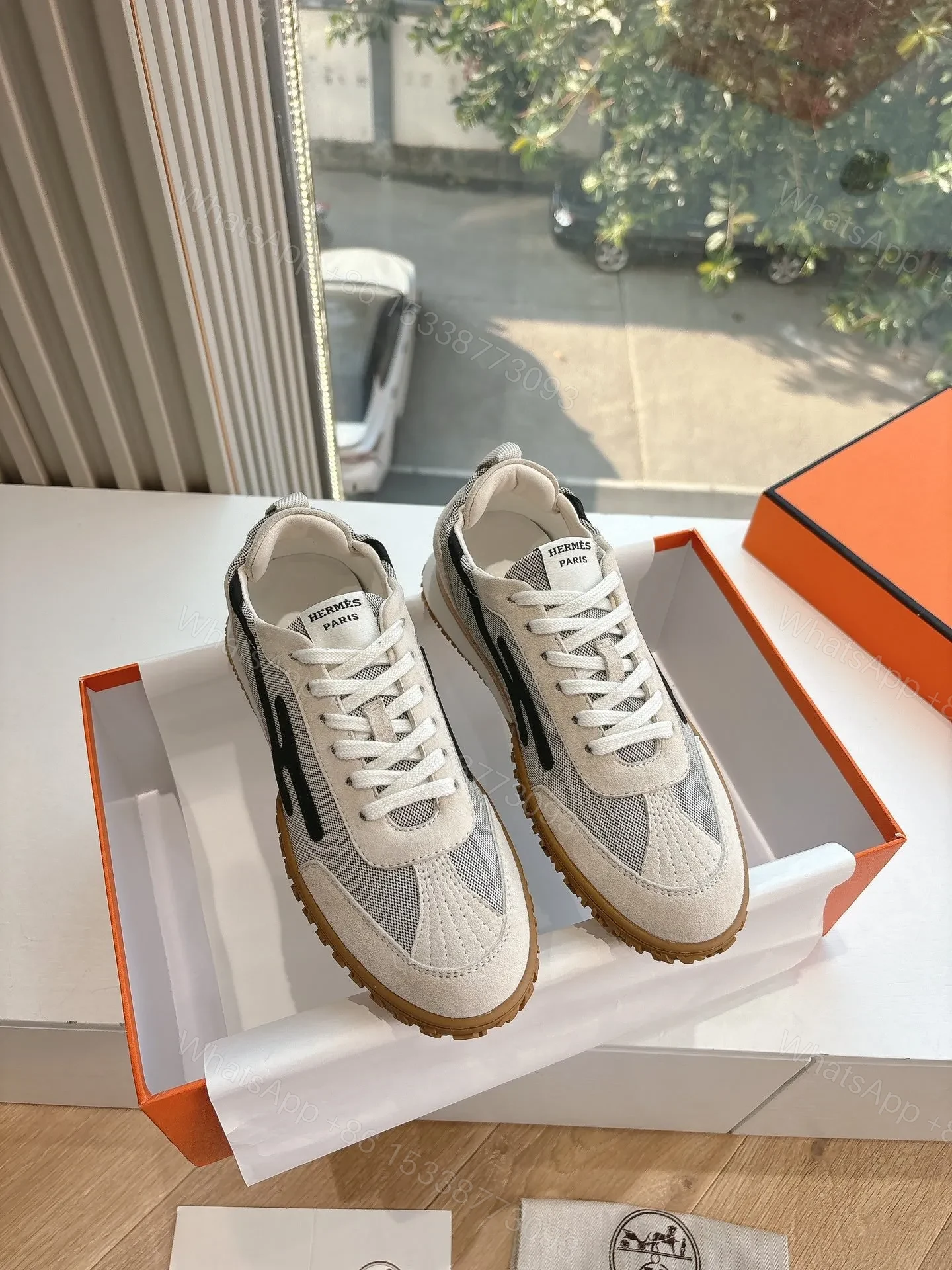 View 3 of Hermes Women White Suede And Mesh Sneakers