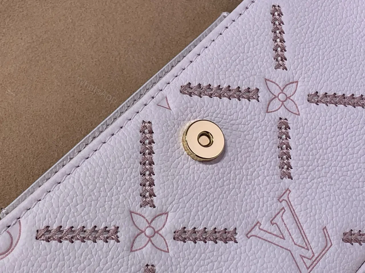 View 7 of Light Pink Pebbled Leather Shoulder Bag with LV Monogram Pattern