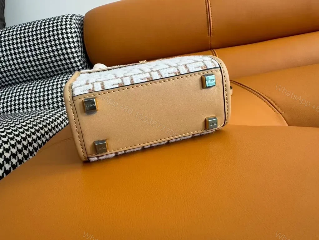 View 5 of Fendi Forma Mini Bag: Monogram Texture, Gold Accents, Crossbody Carry