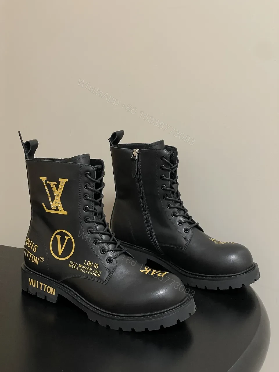 Bold Black Combat Boots with Gold Detailing: All-Day Comfort — view 1