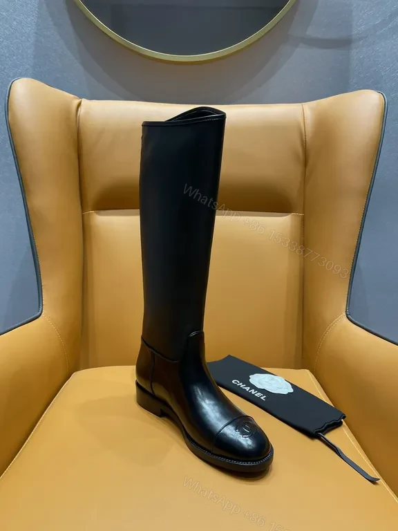 View 8 of Elegant Knee-High Leather Boots - Subtle Luxury Detailing