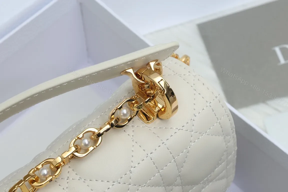 View 7 of Quilted Chic Compact Shoulder Bag with Gold Hardware