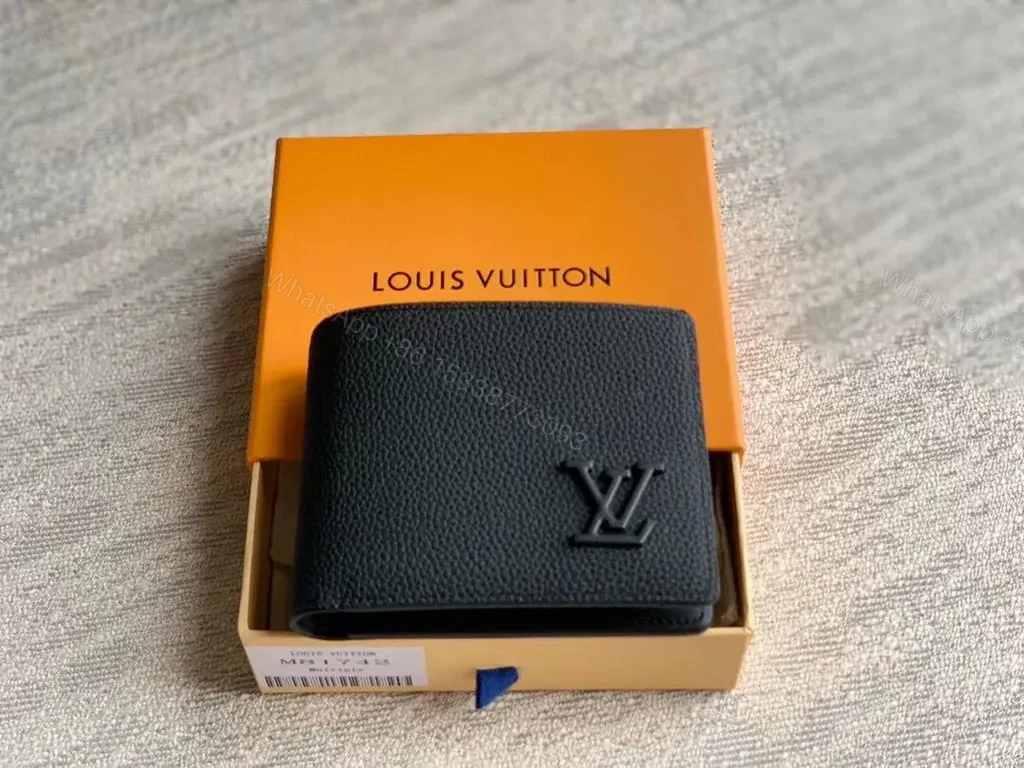 View 3 of Compact Black LV Pebble-Grain Wallet with Discreet Embossing