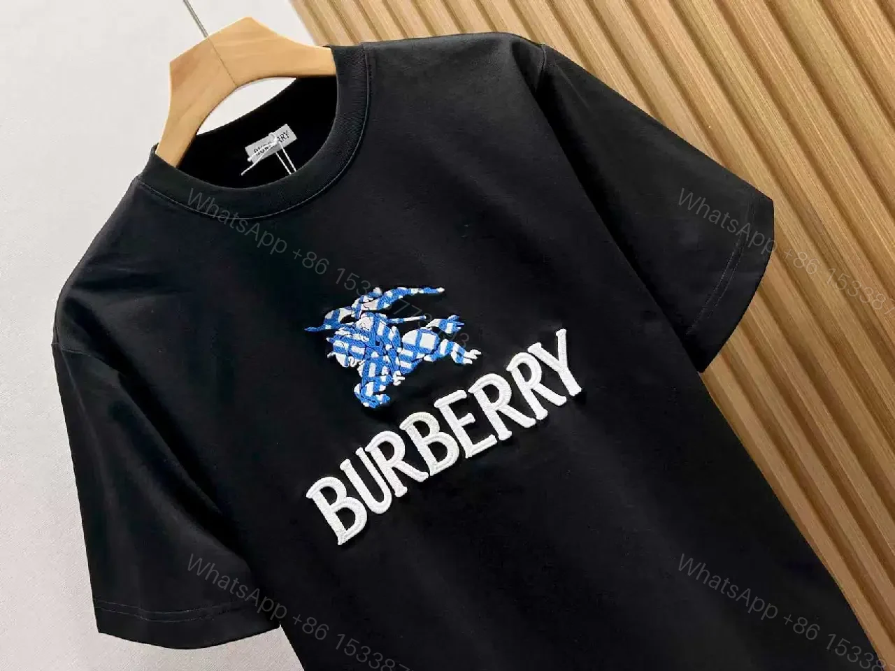 View 10 of Black Knit Tee with Embroidered Crest Logo – Premium Street Style T-shirt