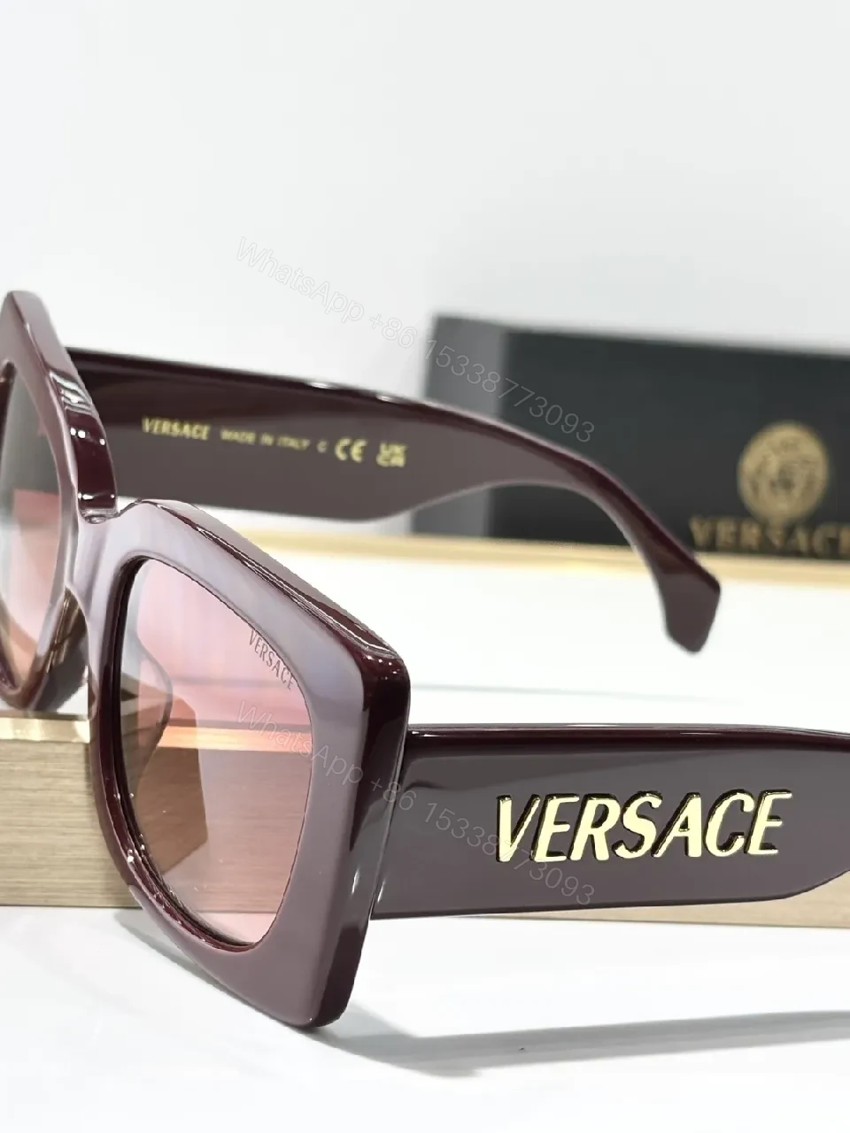 View 4 of Bold Black Statement Sunglasses with Logo-Injected Glamour