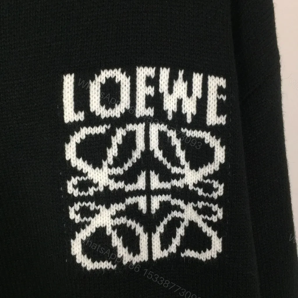 View 4 of Monochrome Black Knit — refined edge, premium warmth