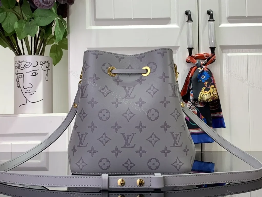 View 5 of Chic Monogram Bucket Bag: Gray Leather, Chain Accent, Versatile Luxury