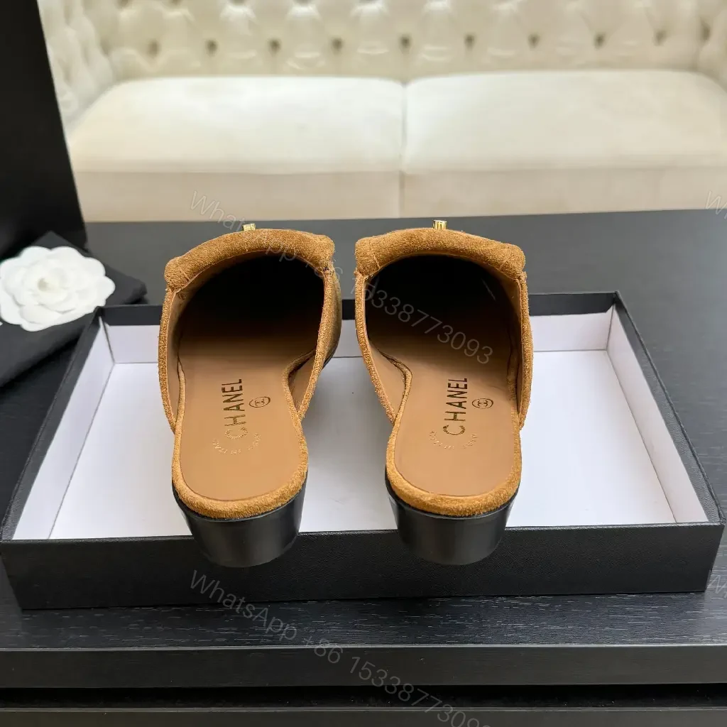 View 2 of Beige Suede Slip-On Mules with Chanel Logo Embellishment