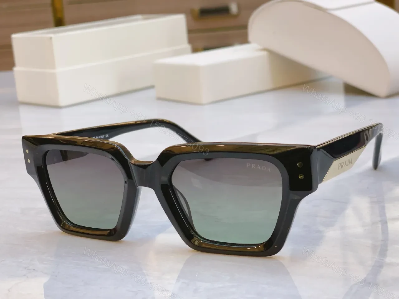 View 2 of Bold Shield Sunglasses with Translucent Gray Frame Difference