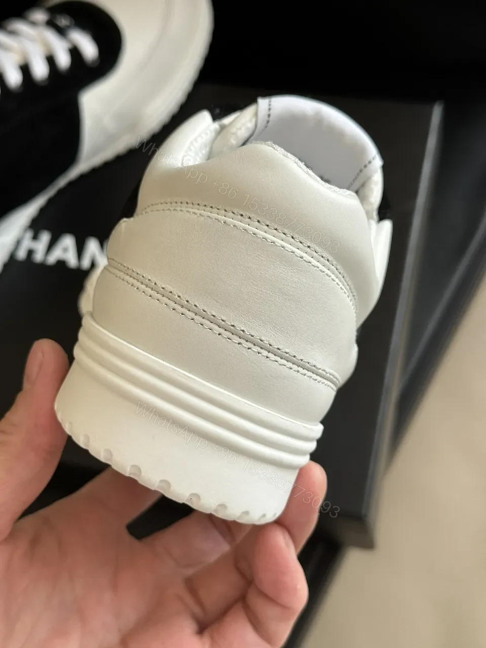 View 5 of Monochrome Leather Sneaker: Refined Comfort & Contrast