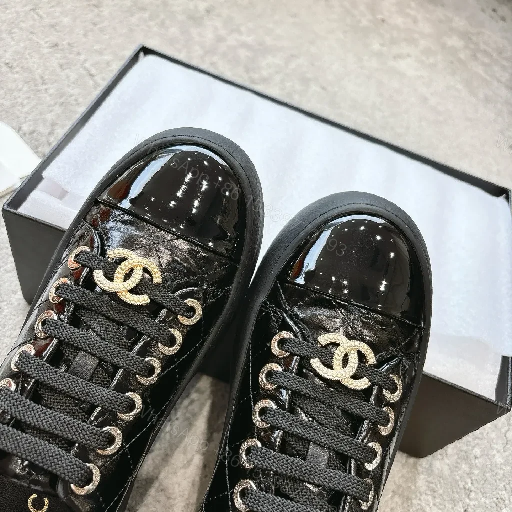 View 7 of Glossy Patent Leather Low-Tops with Gold Logo Hardware Sneakers