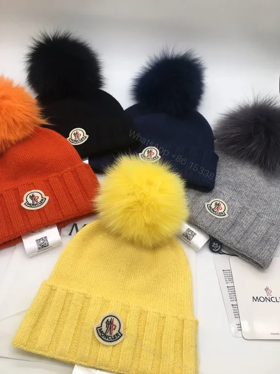 View 9 of Sunny Yellow Moncler Pom Beanie â€“ Luxurious Warmth, Bold Color Pop