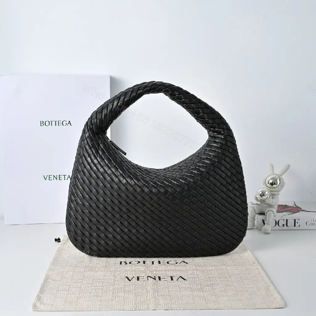 View 7 of Basketweave Handbag in Black – Premium Vegan Leather, Curved Handle, Compact Luxury Bag