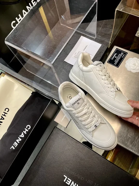 View 3 of White Leather Sneaker with Gold Detailing â€” Modern Luxury Casual Sneaker