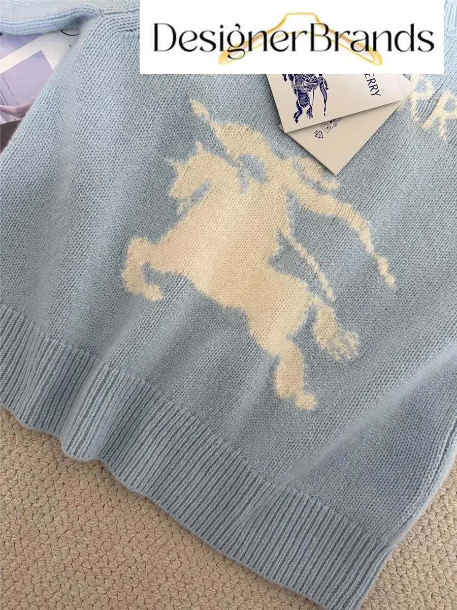 View 6 of Soft blue knit sweater, logo pony, cropped fit, premium casual style