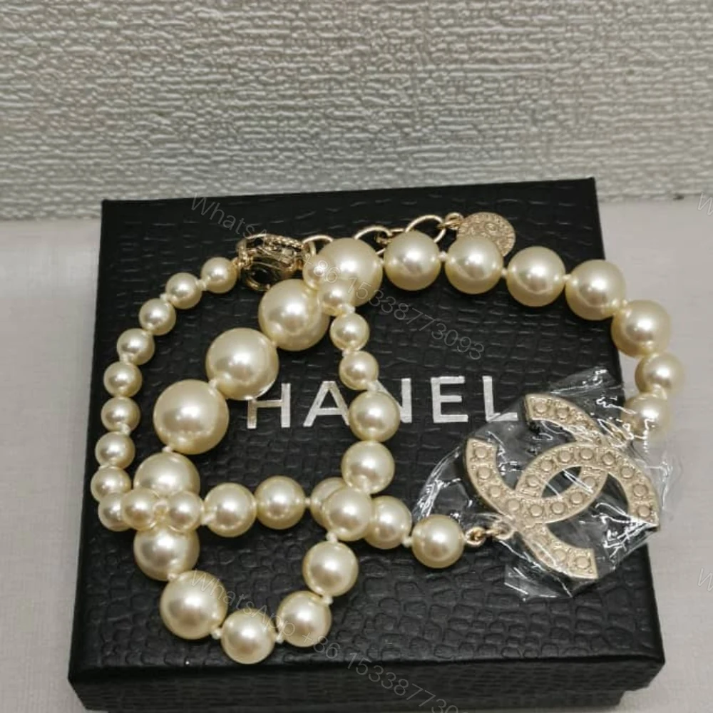View 2 of Chanel Metallic Silver Tone Coco Faux Pearl CC Necklace