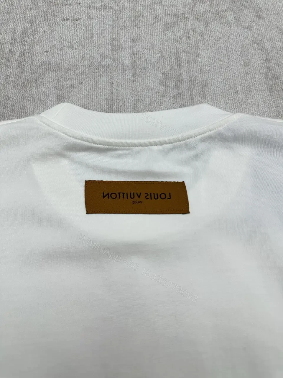 View 2 of Minimalist Luxe White Crewneck with Subtle Embossed DetailTop