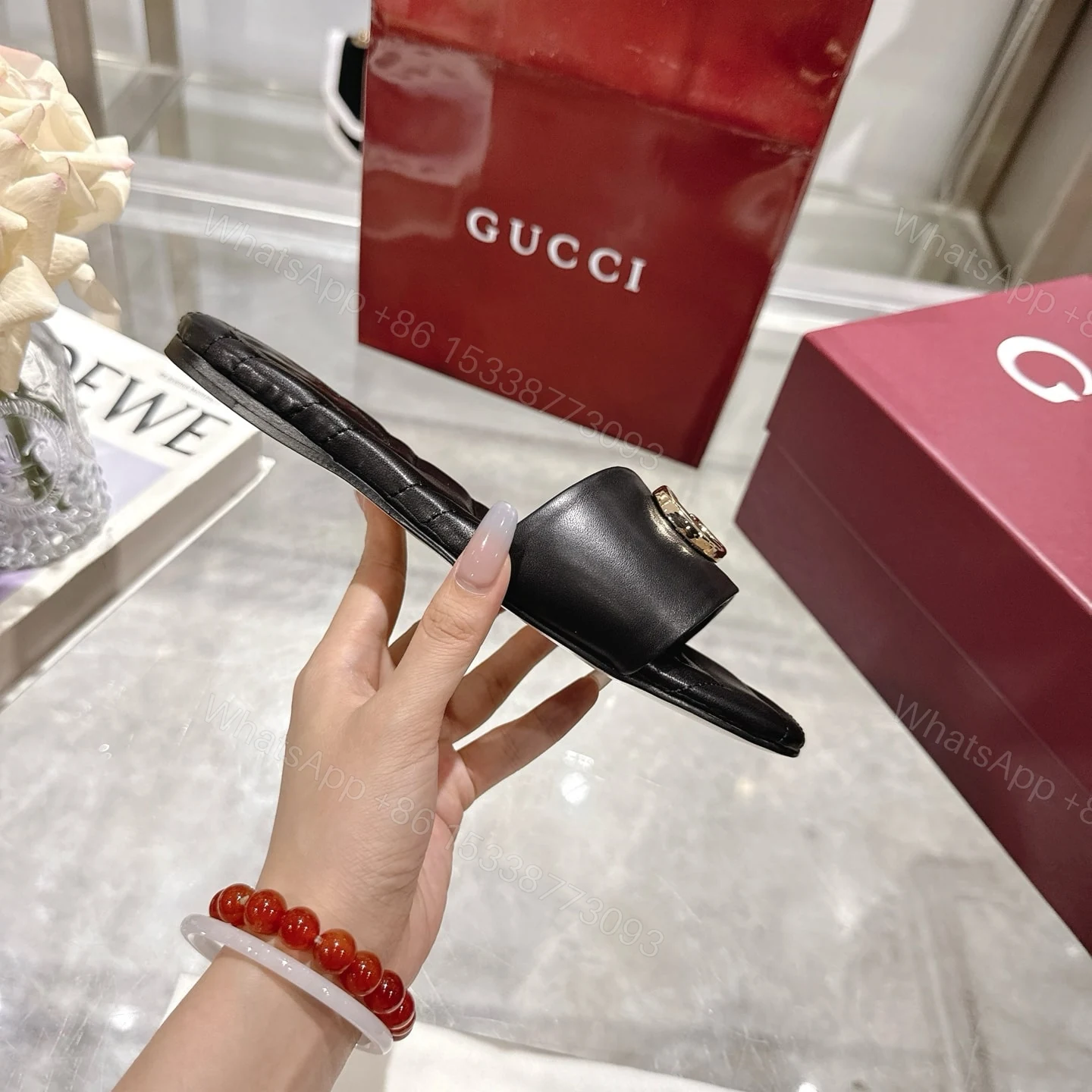 View 6 of GUCCI WOMEN SLIDE SANDAL WITH DOUBLE G BLACK ‎832449 BKO00 1000