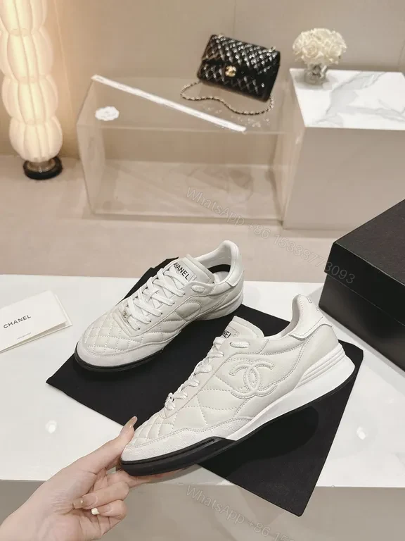 View 3 of White Quilted Platform Sneakers with Chanel Detailing