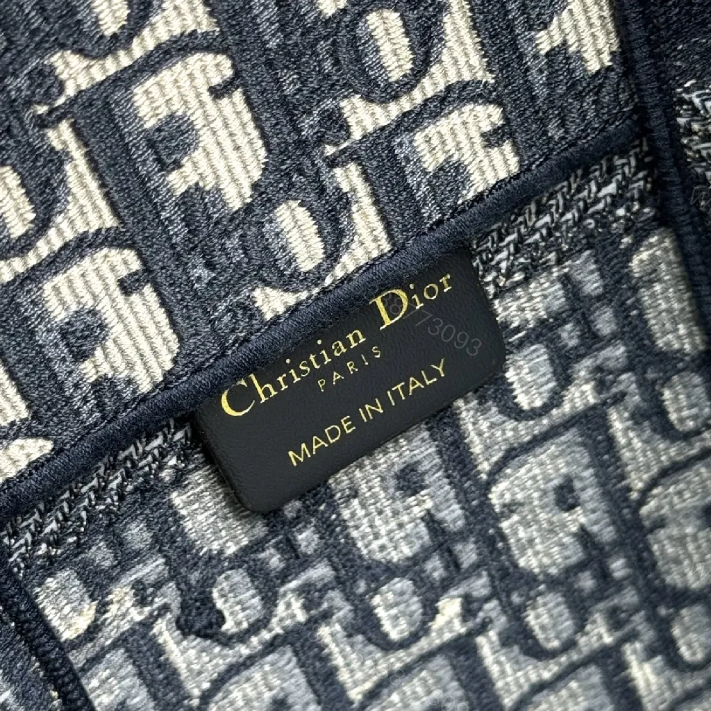 View 3 of Compact Monogram Crossbody: Luxe, Structured, Everyday News