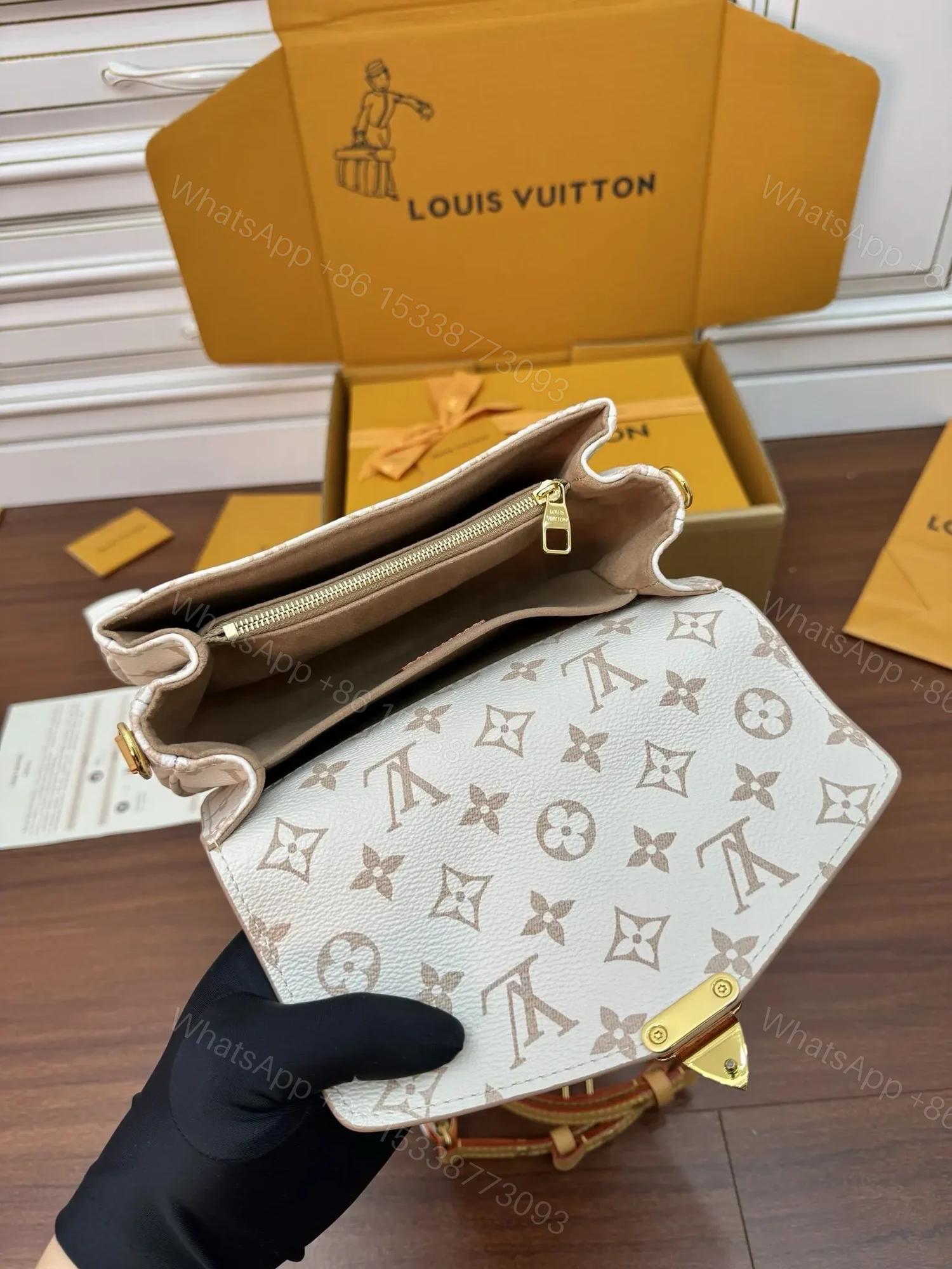 View 6 of Louis Vuitton Pochette Métis East West
