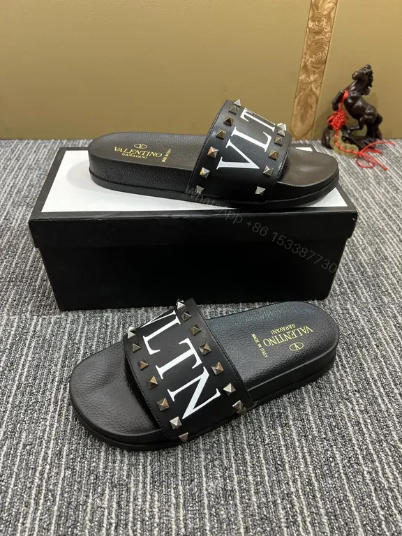 View 2 of Valentino Rockstud Leather Slides â€“ Black, Cushioned comfort