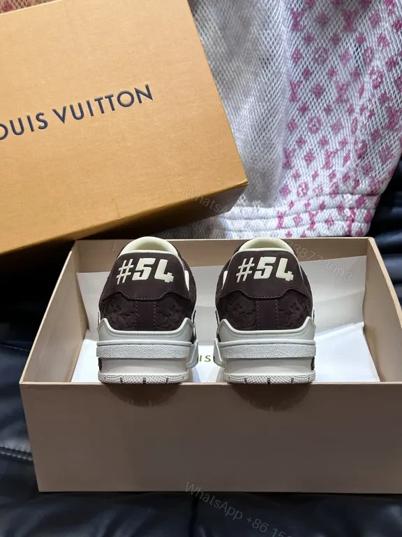 View 5 of Bold Textured High-Top Sneakers with LV Detailing