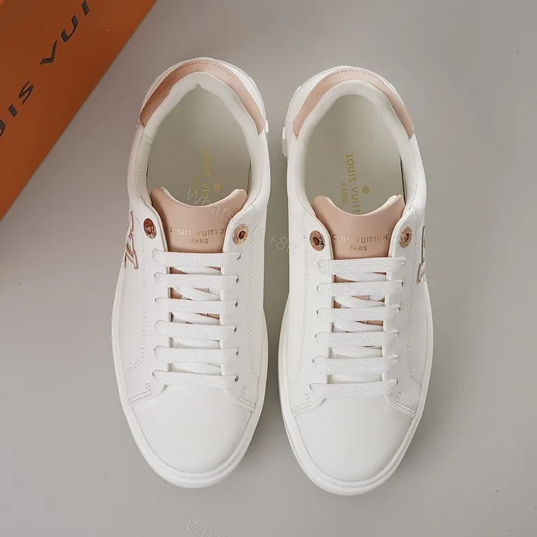 View 3 of Polished Everyday Comfort: White Leather Sneaker with Blush LV Accent