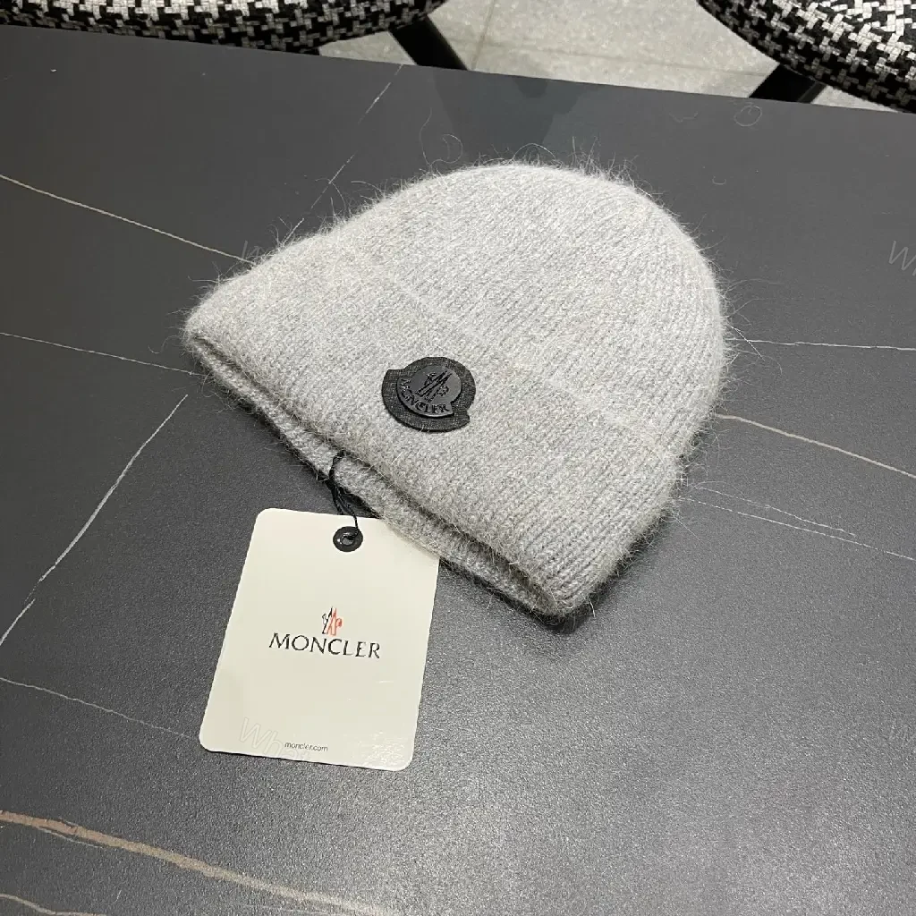 View 2 of Cozy Perimeter Beanie: Textured Knit, Subtle Emblem, Neutral Gray
