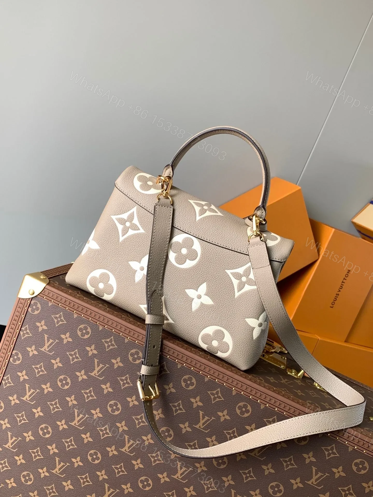 View 5 of LV MADELEINE 30 IN BEIGE MONOGRAM CALFSKIN EMBOSSED LOGO
