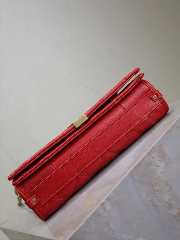 View 8 of Radiant Red Quilted Leather Crossbody Bag with Gold Emblem