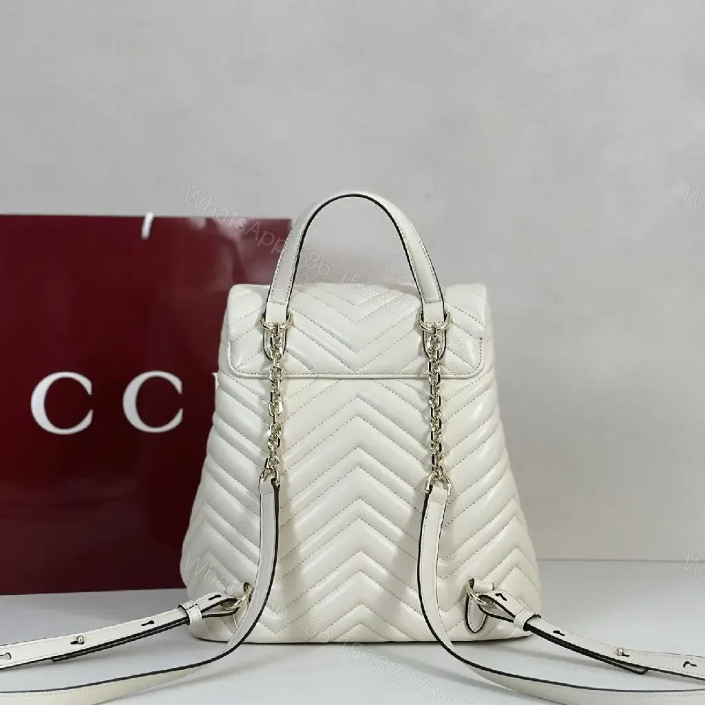 View 2 of Off-White Cream Quilted Chevron Backback with Gold Logo Flap
