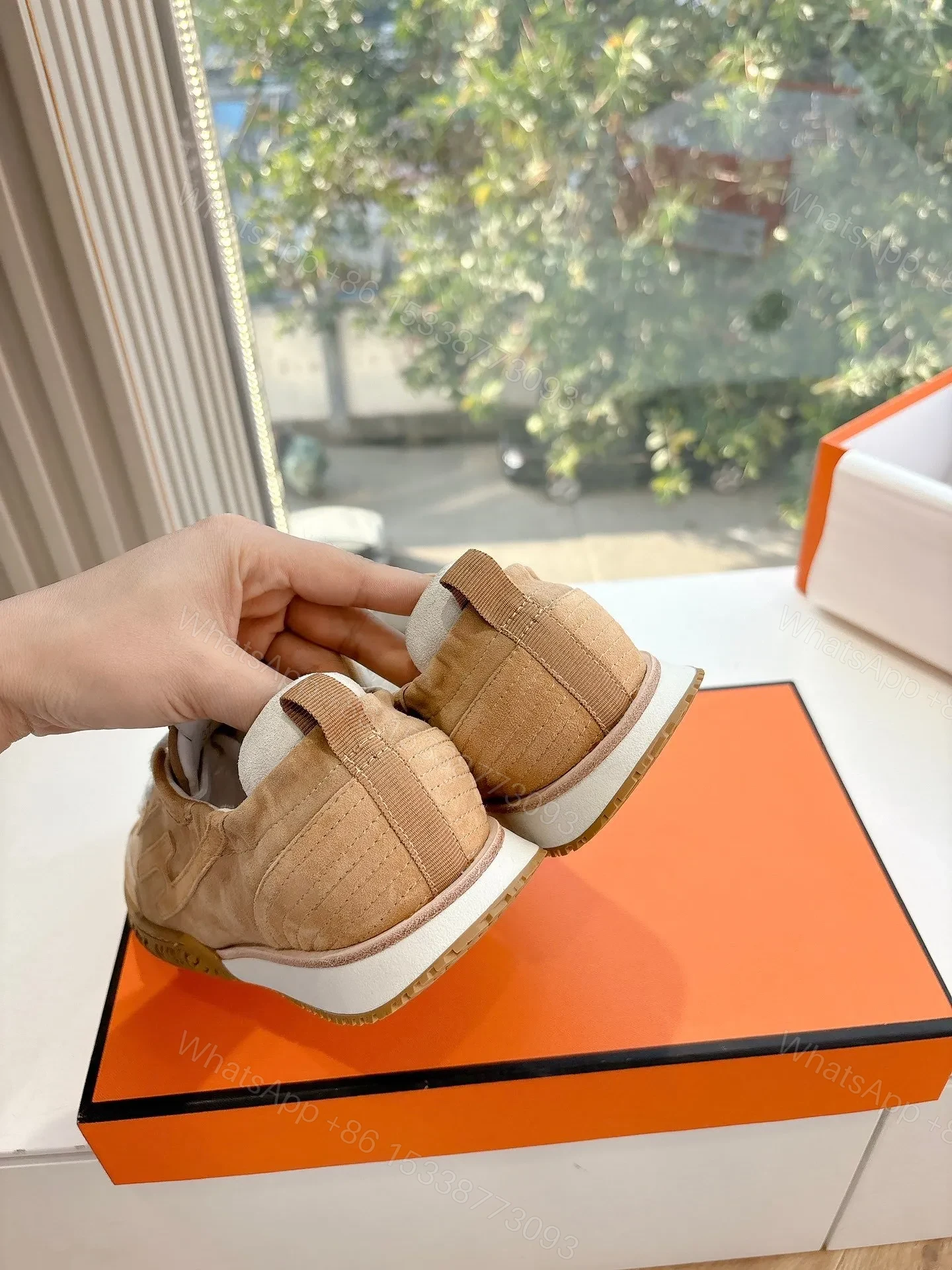 View 3 of Hermes Women Beige Suede Sneakers