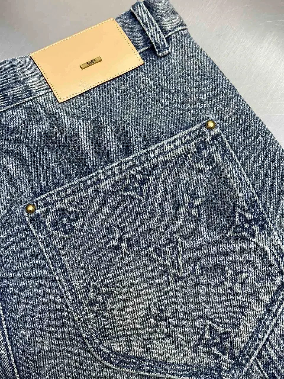 View 2 of Blue Denim Jeans Short - Louis Vuitton Embroidered Style Key Feature