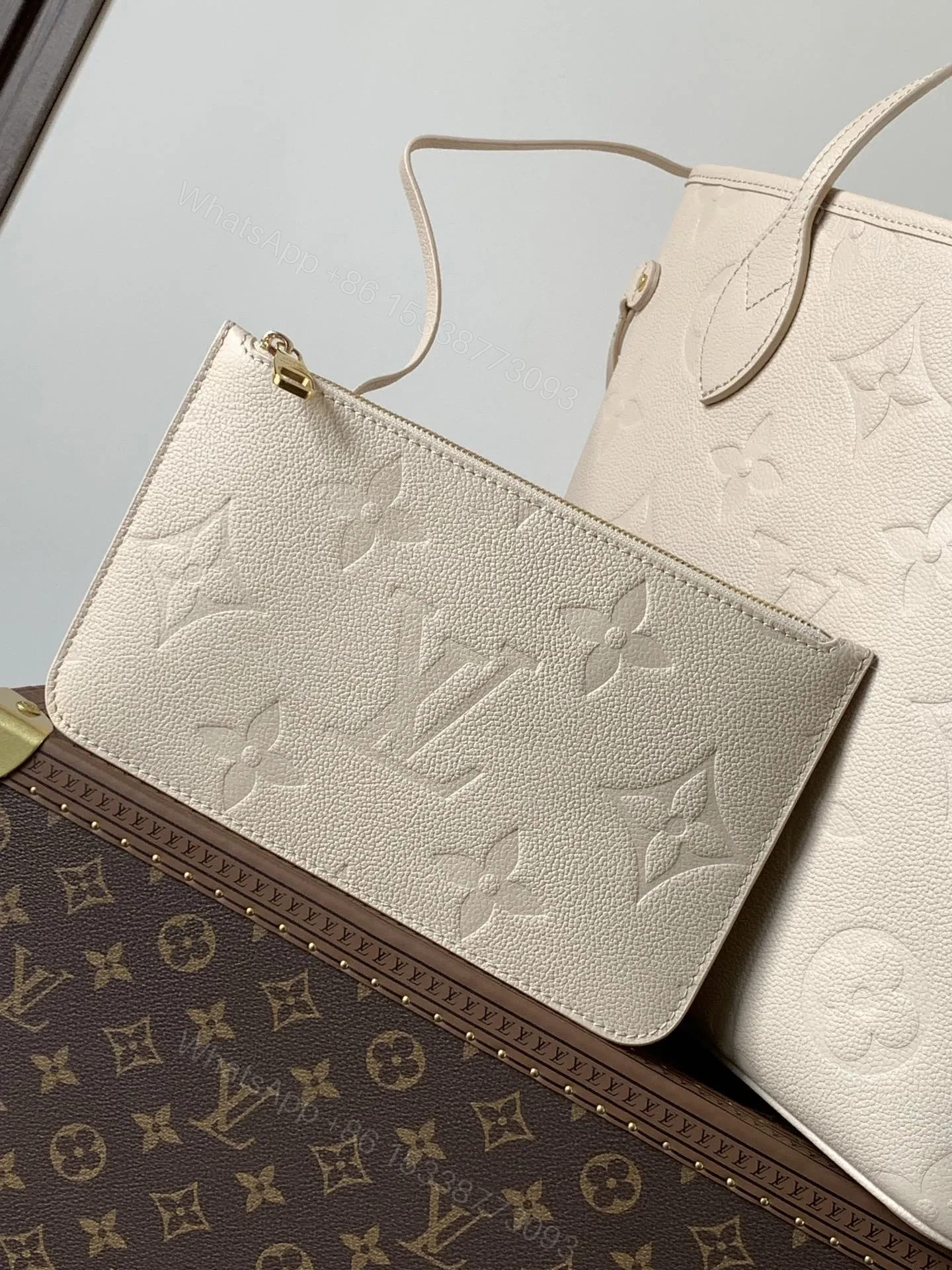 View 4 of LV NEVERFULL 32 LIGHT BEIGE MONOGRAM EMPREINTE LEATHER