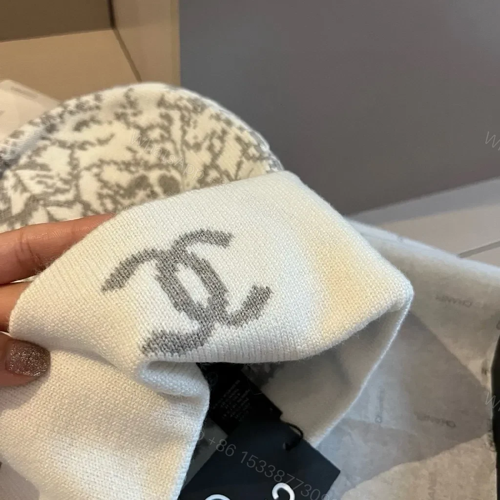 View 2 of Textured Jacquard Beanie Set – Luxe Logo Knit Warmth