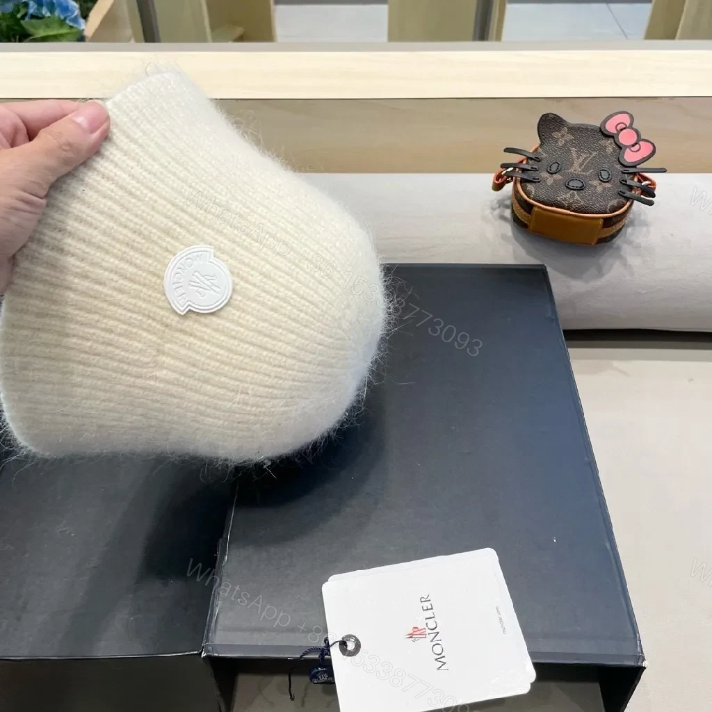 View 8 of Soft Wool Knit Beanie: Luxury Comfort, Crest Logo, Unisex