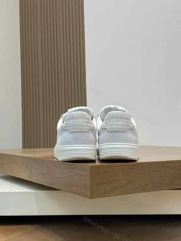 View 5 of White Leather-Trim Sneaker: luxury high-top with subtle Chanel-inspired detailing