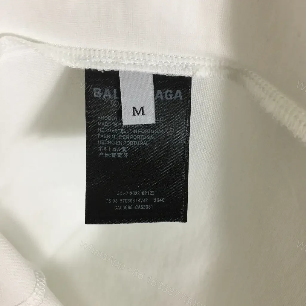 View 3 of Minimalist White Tee with Luxe Subtle Logo – Modern Essential T-Shirt