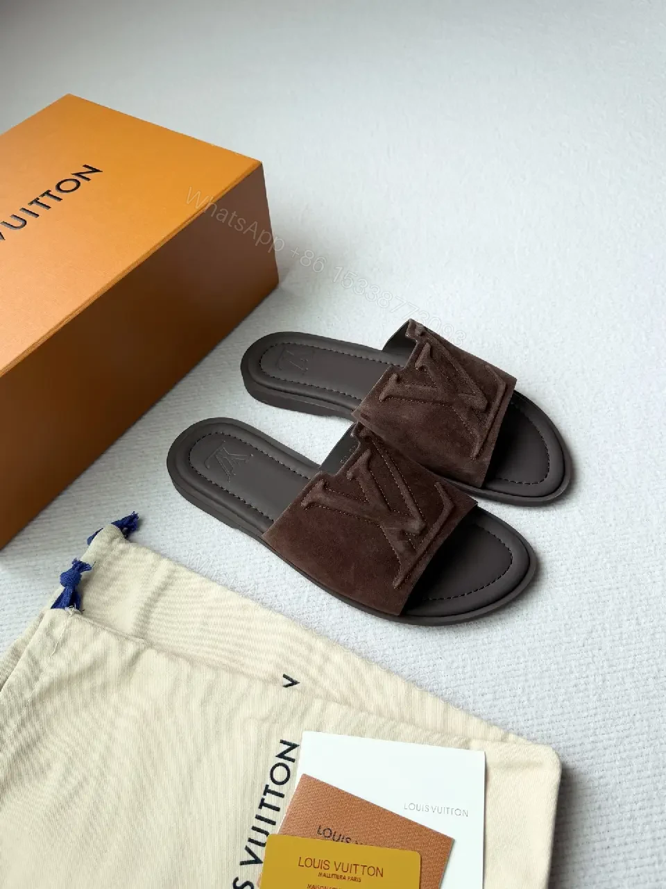 View 4 of Textured Suede Slide with LV Detailing