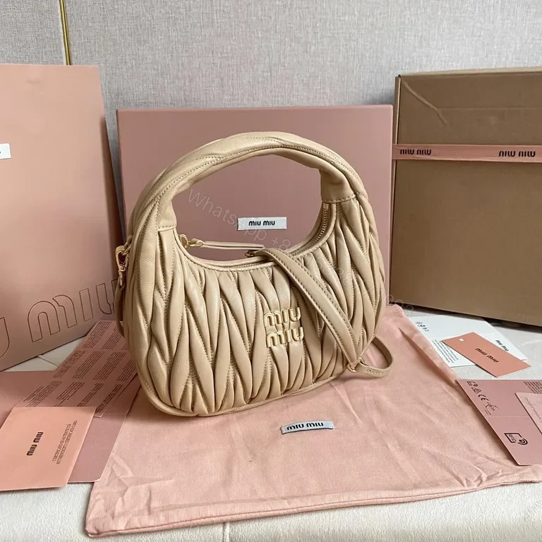 View 2 of Chic Quilted Leather Bag: Compact Luxury, Blush, Miu Miu Style